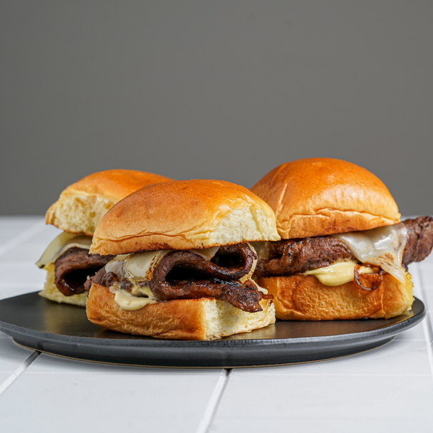 Cheesesteak Sliders with Caramelized Onions and Dijon Aioli