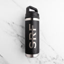 Black insulated bottle with SRT logo on a marble surface