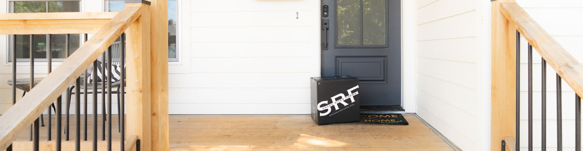 Front door of a house with a box with 'SFR' branding.