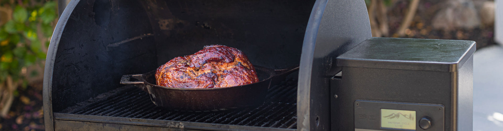 Smoked and glazed Ham in a pan 