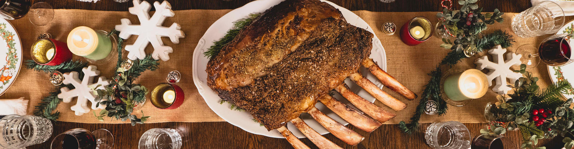 Roast tomahawk roast on a wooden table with Christmas decorations