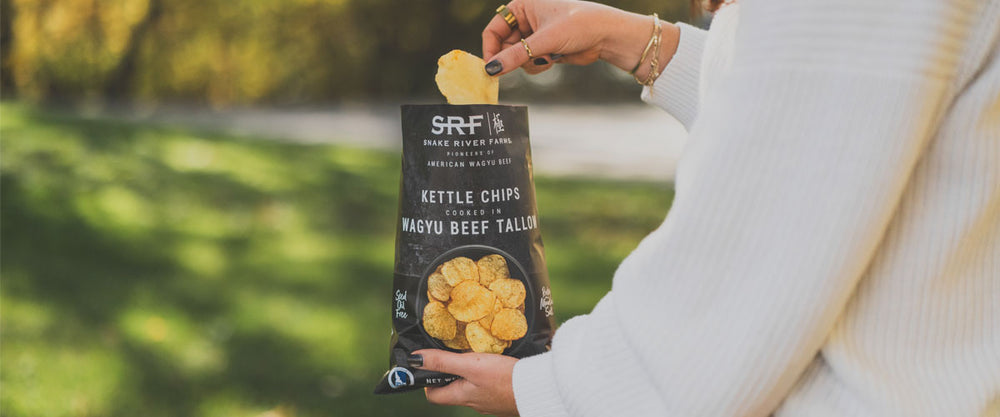 SRF Wagyu Beef Tallow Chips being eaten outside