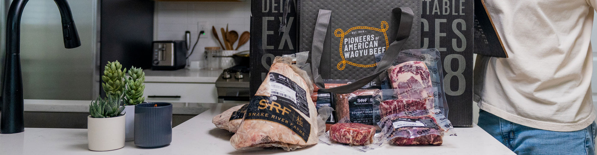 Meat packages on a table with a kitchen background